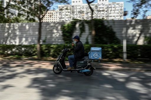 Des livreurs en Chine